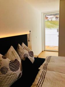 Posteľ alebo postele v izbe v ubytovaní Arlberg Mountain Resort
