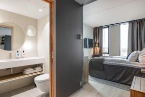 Postel nebo postele na pokoji v ubytování Quality Hotel Ramsalt