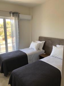 A bed or beds in a room at Venetia apartment