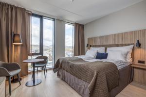 Postel nebo postele na pokoji v ubytování Quality Hotel Ramsalt