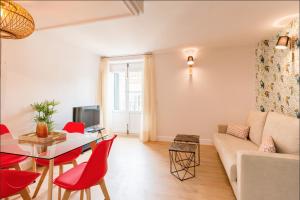 Televízia a/alebo spoločenská miestnosť v ubytovaní Merced10 Duplex 3I