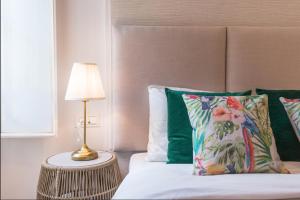 A bed or beds in a room at Merced10 Duplex 3I