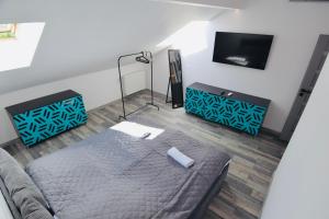 Posteľ alebo postele v izbe v ubytovaní Apartamenty Żołnierska 31 - Apartament nr 1