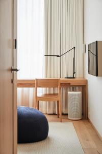 Postel nebo postele na pokoji v ubytování MUJI HOTEL GINZA