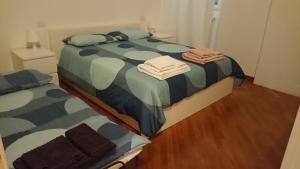 A bed or beds in a room at Il Fortino - The Refuge