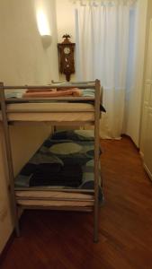 A bed or beds in a room at Il Fortino - The Refuge