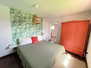 Posteľ alebo postele v izbe v ubytovaní Casa con piscina y jardín con vistas al mar