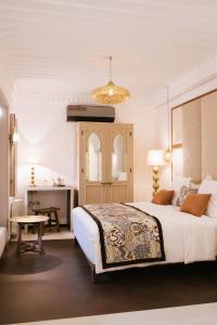 Postel nebo postele na pokoji v ubytování Riad Nyla Wellness and Spa