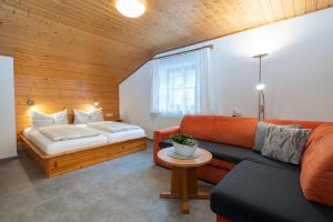 Postel nebo postele na pokoji v ubytování Gästehaus Fitsch - Ferienwohnung in Silbertal