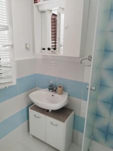 Ванная комната в Ivana Apartment