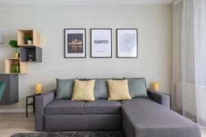 A seating area at Second Home Apartment
