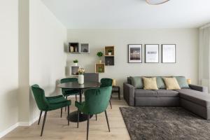 A seating area at Second Home Apartment