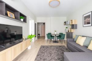 A seating area at Second Home Apartment