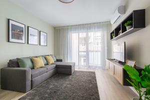 A seating area at Second Home Apartment