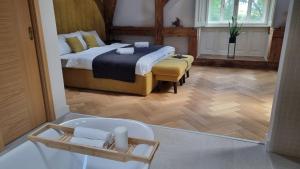 Posteľ alebo postele v izbe v ubytovaní MANOR Boutique Hotel