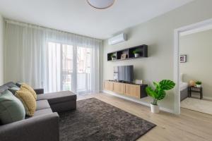 A seating area at Second Home Apartment