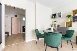A kitchen or kitchenette at Second Home Apartment