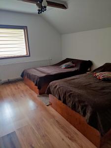 Katil atau katil-katil dalam bilik di CASA HAIDUCILOR SATIC +32 gambar