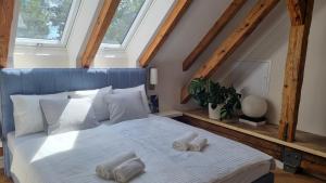 Posteľ alebo postele v izbe v ubytovaní MANOR Boutique Hotel