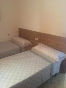 Postel nebo postele na pokoji v ubytování Piles - Apartment - Sleeps 7 - Parking - Seafront
