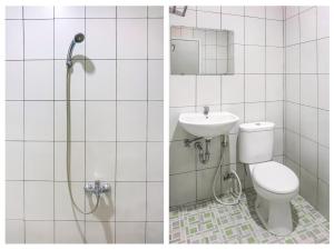 A bathroom at OYO 91316 Hh Guest House Makassar