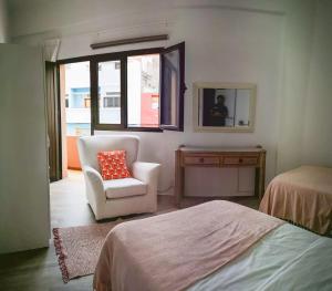 Ein Bett oder Betten in einem Zimmer der Unterkunft Luisan Guanarteme