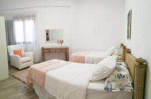 Ein Bett oder Betten in einem Zimmer der Unterkunft Luisan Guanarteme