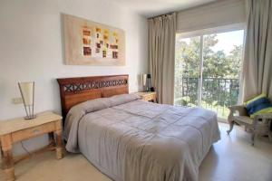 Un ou plusieurs lits dans un hébergement de l'établissement Immaculate 2-Bed Beach Apartment in Costa del Sol