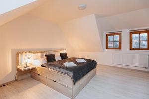 Postel nebo postele na pokoji v ubytování Orava Village + 37 fotografií