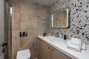 Koupelna v ubytování cattleya suite lindos + 9 fotografií