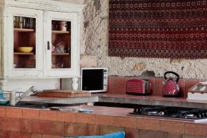 Kuchyň nebo kuchyňský kout v ubytování Angel Village