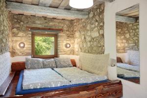 Postel nebo postele na pokoji v ubytování Angel Village