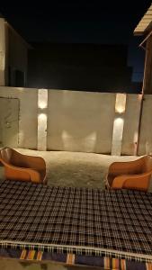 Posezení v ubytování Ira Homestay Mathura - Divine Spiritual Stay