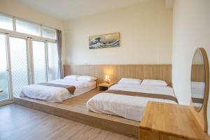 מיטה או מיטות בחדר ב-Meet Xiashu