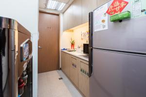 Kuchyň nebo kuchyňský kout v ubytování CU Hotel Taipei
