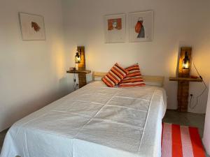 Ένα ή περισσότερα κρεβάτια σε δωμάτιο στο Casal de Santanna