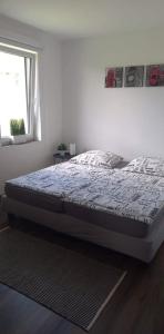 Легло или легла в стая в Bridgiet Home Apartman