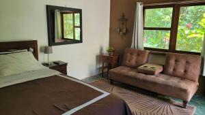 Postel nebo postele na pokoji v ubytování Casa Cangrejal B&B Hotel
