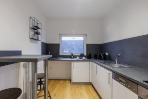 Kuchyň nebo kuchyňský kout v ubytování Glück Auf Appartements Lösorter Straße Duisburg