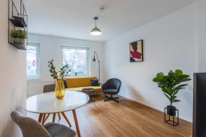 Posezení v ubytování Glück Auf Appartements Lösorter Straße Duisburg