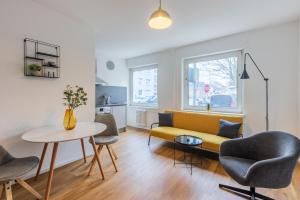Posezení v ubytování Glück Auf Appartements Lösorter Straße Duisburg