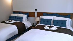 Postel nebo postele na pokoji v ubytování Hotel Nak'An Secreto Maya