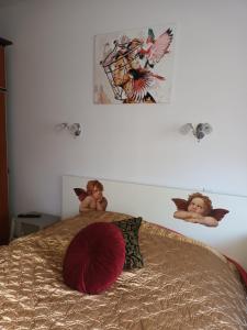 Łóżko lub łóżka w pokoju w obiekcie Studio in Kretomino