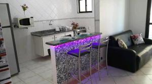 Η κουζίνα ή μικρή κουζίνα στο Apartamento Dias Felizes! +12 φωτογραφίες