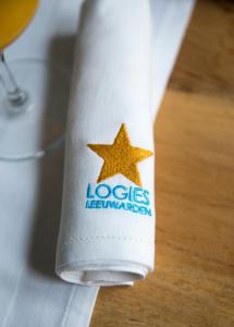 a roll of toilet paper with a star on it at Sterlogies City Apartment Monsieur Philippe in Leeuwarden