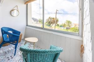 Posedenie v ubytovaní La Tortue Joyeuse - Appartement avec Loggia