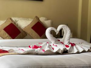 Hotel Sakura Durbarにあるベッド