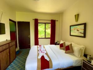 Hotel Sakura Durbarにあるベッド