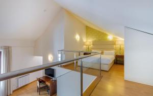 Cama o camas de una habitación en Oca Vitoria Village