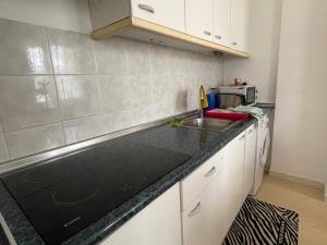 Een keuken of kitchenette bij Ocean Sunrise